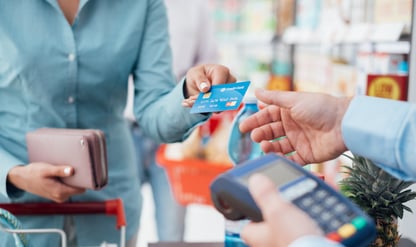 Women paying with credit card